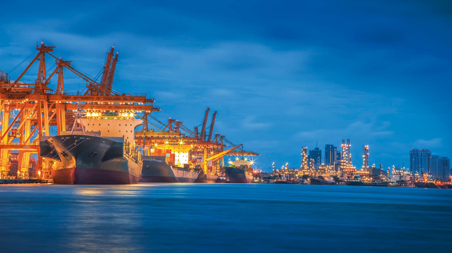 Port at night as a symbol of sea freight